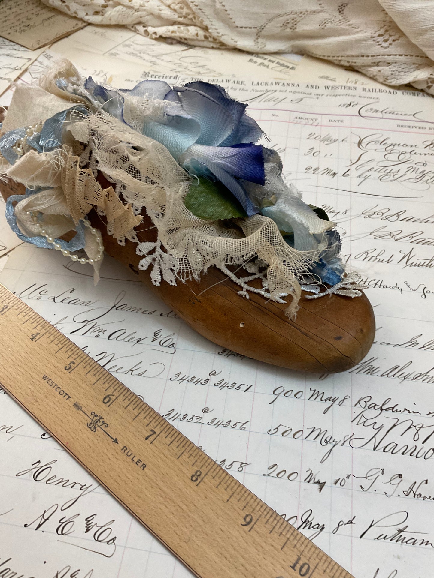 Vintage shoe form with blue flowers