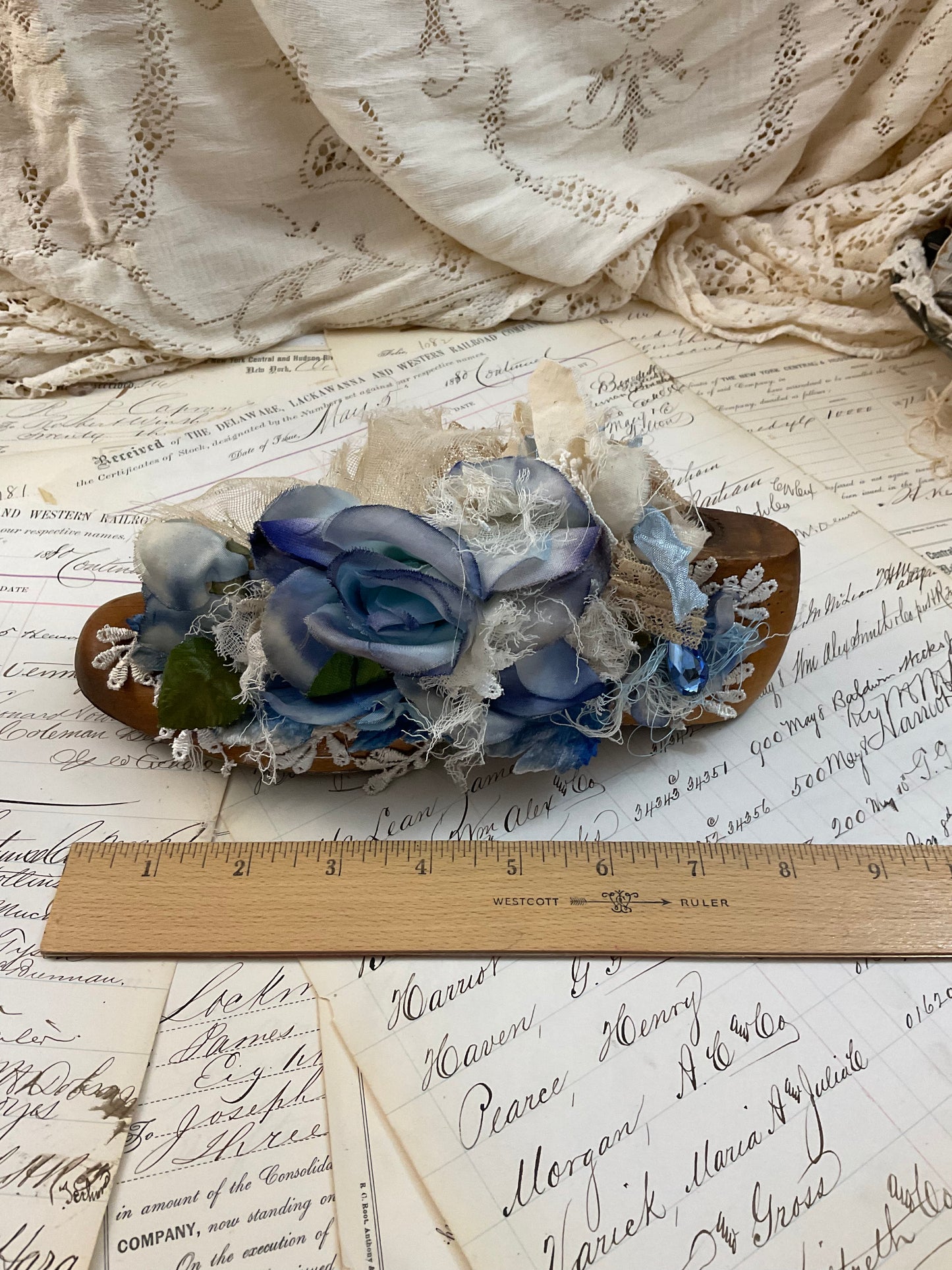 Vintage shoe form with blue flowers