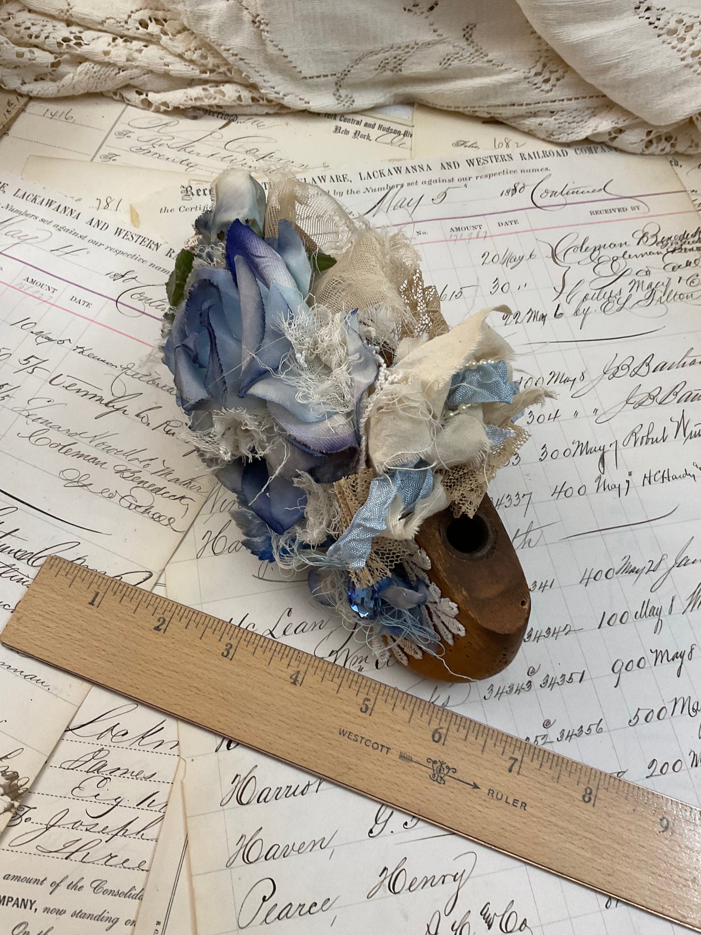 Vintage shoe form with blue flowers