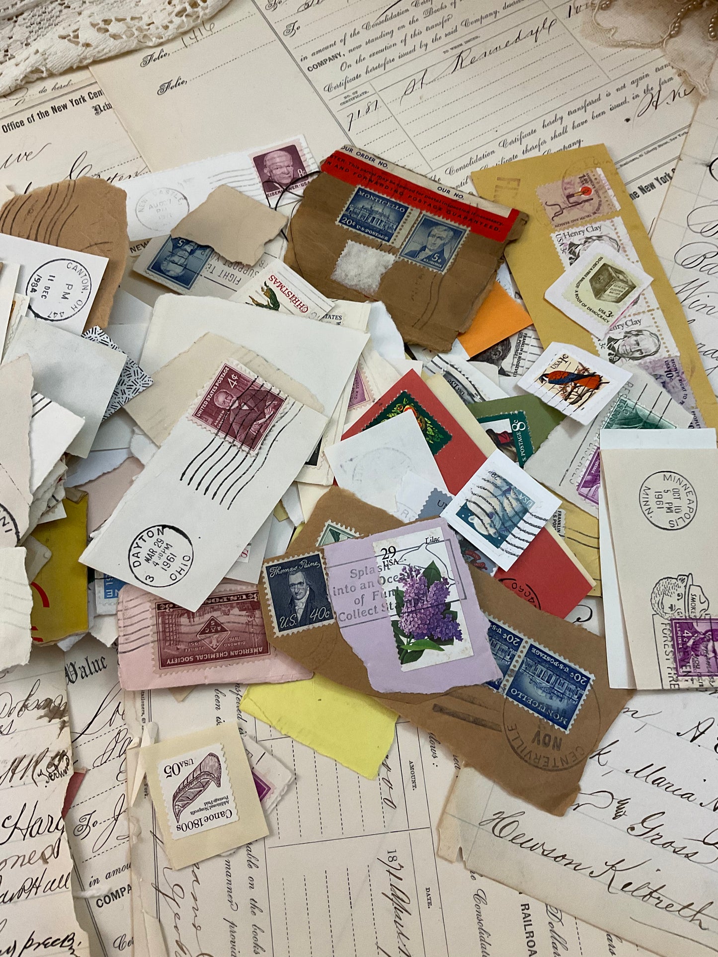 Stamps (torn off the envelopes.)